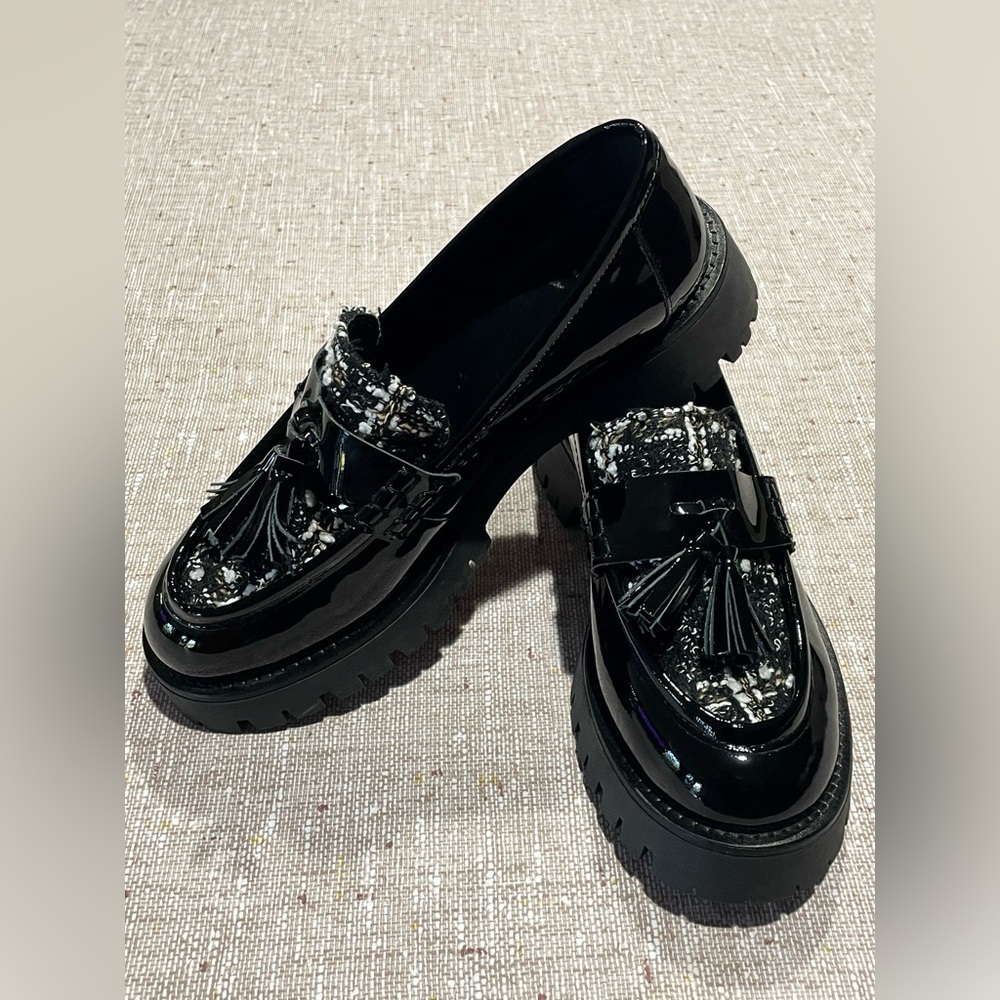 Black Patent Leather Tassel Loafers by Bruno Magli. 
EU 39.5
US 9 - Picture 16 of 16